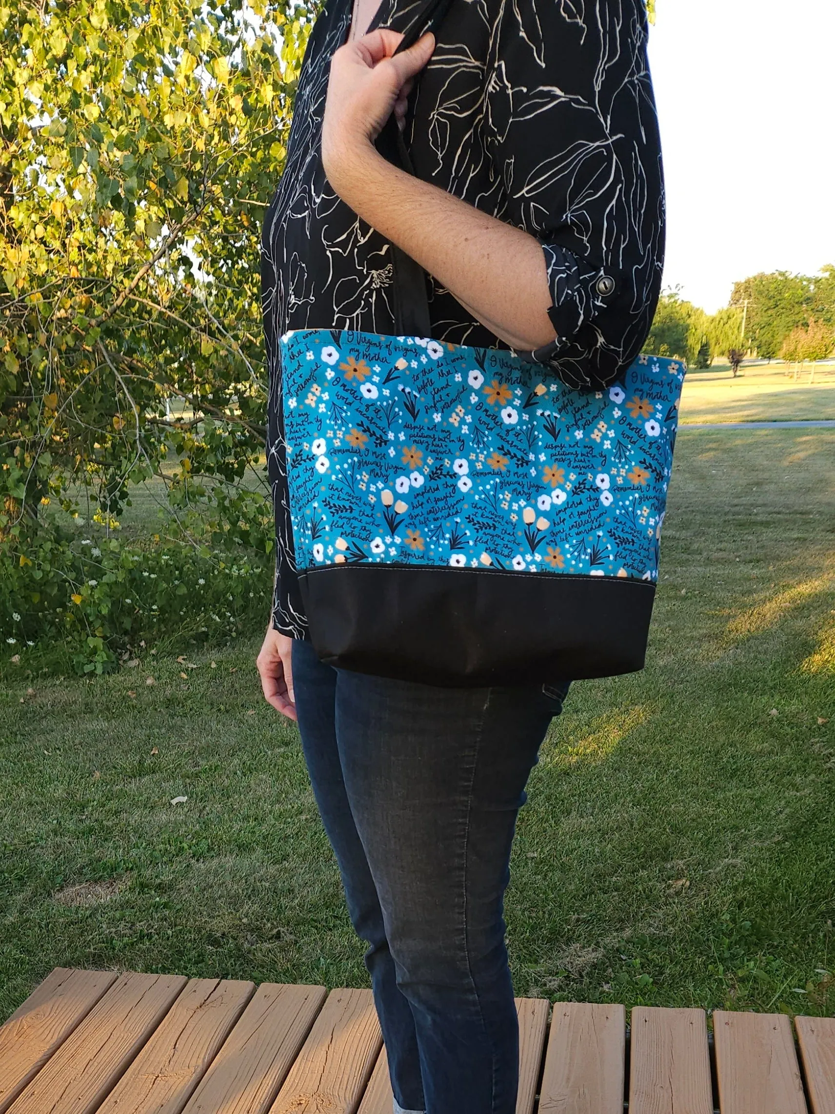 Memorare Tote Bag with waterproof canvas interior and slip pockets